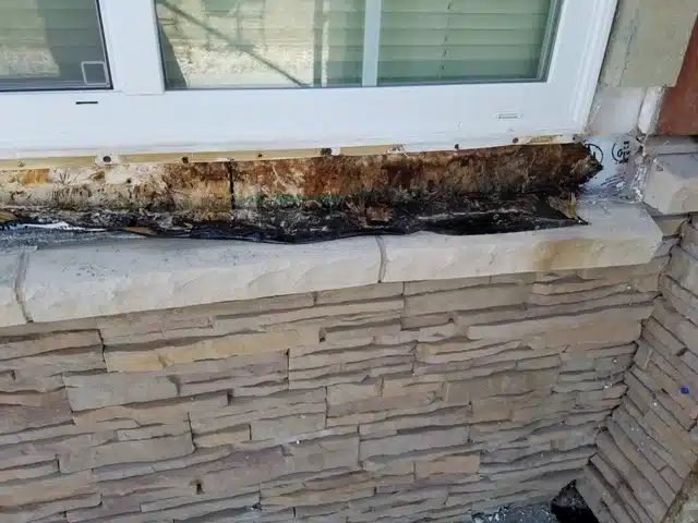 Stone Veneer Inspection - Window with Water Damage